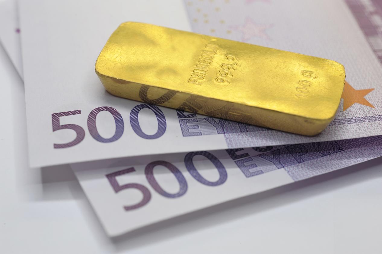 gold bar on Euro banknotes