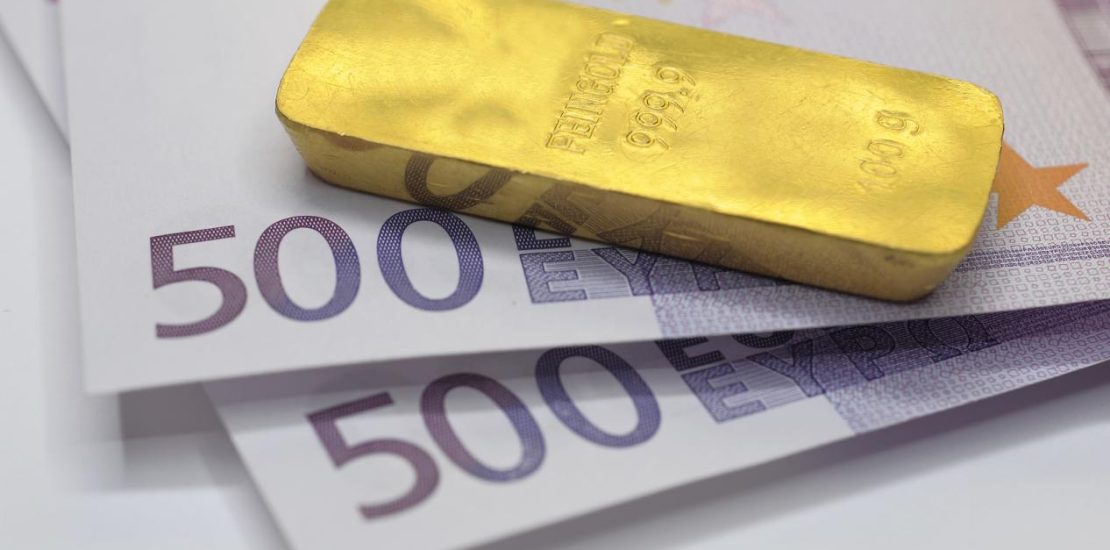 gold bar on Euro banknotes