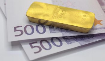 gold bar on Euro banknotes